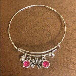 A bow and heart bracelet